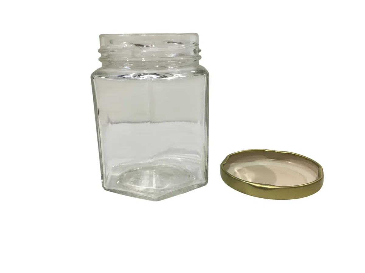 Vaso in vetro esagonale ml 190, per 250 gr miele (conf. da 32 pezzi) completo di tappo